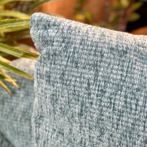 Teal Sofa W/2 Patterned Cushions