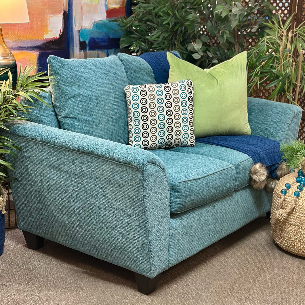 Teal Loveseat W/Patterned Cushion
