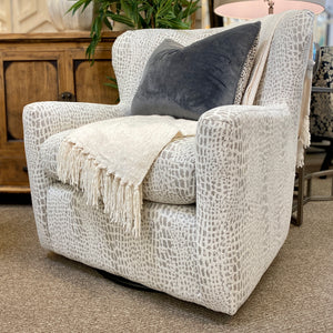 Ivory Animal Print Swivel Glider